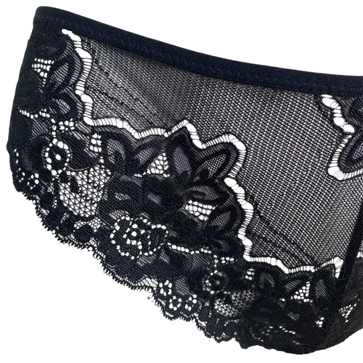 Black lace underwear on a white background
