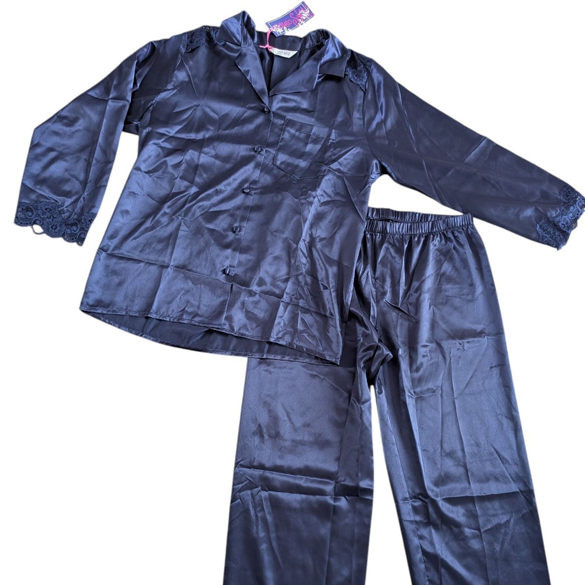 Navy raincoat and pants set on a white background